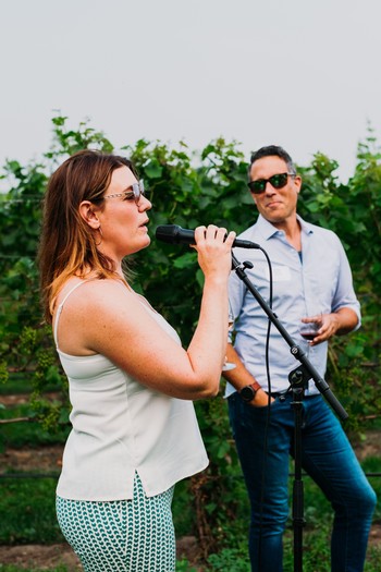 Couple singing at the Leelanau Grown event